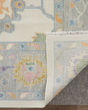 Karina 69G9F Ivory/Orange/Blue Rug